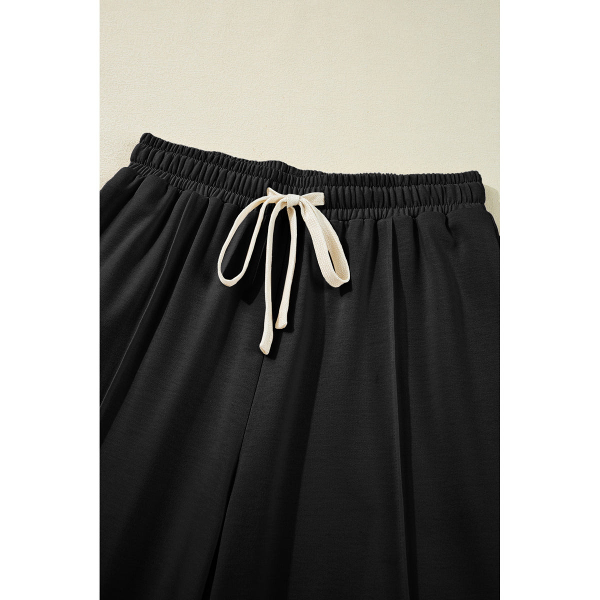 Black Drawstring Cargo Pants with Front Seams in Black - drawstring waistband detail