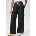 Black Drawstring Cargo Pants with Front Seams in Black - front fit view